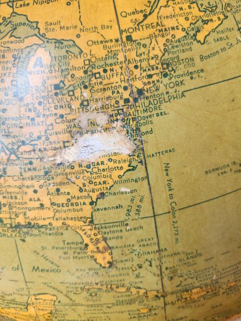 Section of a globe with Virginia rubbed out with wear