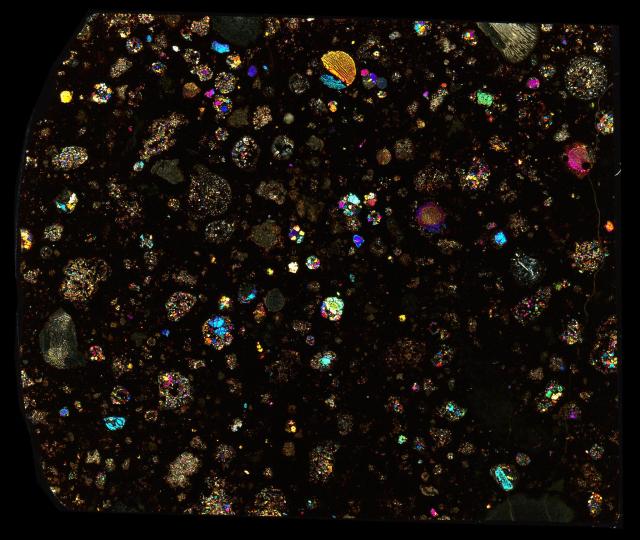 Northwest Africa (NWA) 5930 Meteorite Thin Section - XPL HDR Pathscan Enabler.

Solar Anamnesis, CC BY-NC-SA 2.0 via Flickr: https://flic.kr/p/2hVxJKQ