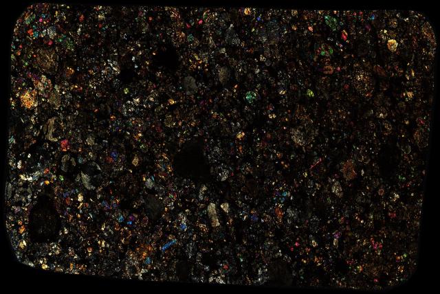 Santa Vitoria do Palmar Meteorite Thin Section - XPL Pathscan Enabler.

Solar Anamnesis, CC BY-NC-SA 2.0 via Flickr: https://flic.kr/p/2hiM2vQ