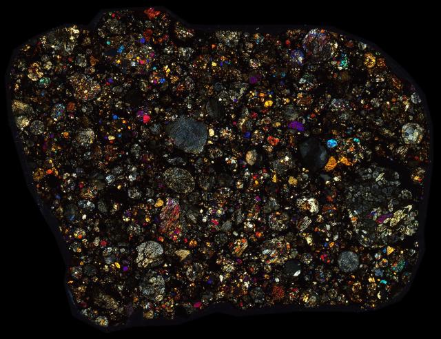 Northwest Africa (NWA) 960 Meteorite Thin Section - XPL HDR Pathscan Enabler.

Solar Anamnesis, CC BY-NC-SA 2.0 via Flickr: https://flic.kr/p/2hZ1Shc