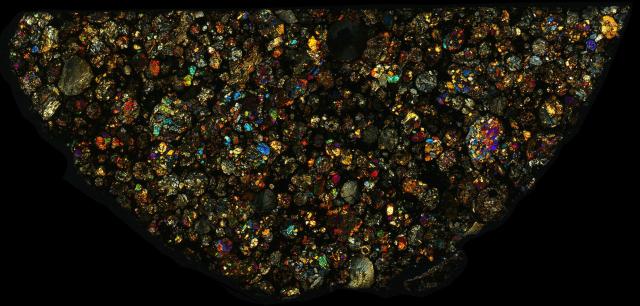 Northwest Africa (NWA) 10306 Meteorite Thin Section - XPL HDR Pathscan Enabler.

Solar Anamnesis, CC BY-NC-SA 2.0 via Flickr: https://flic.kr/p/2hmSHg8