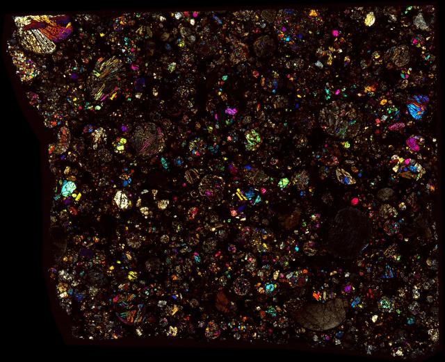 Northwest Africa (NWA) 12577 Meteorite Thin Section - XPL HDR Pathscan Enabler.

Solar Anamnesis, CC BY-NC-SA 2.0 via Flickr: https://flic.kr/p/2i2CEK5