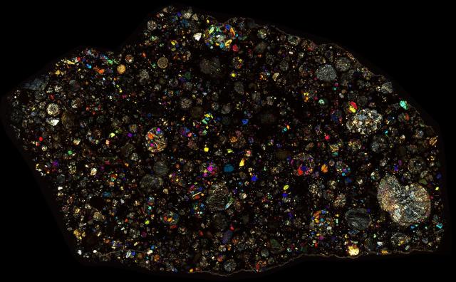 Northwest Africa (NWA) 12009 Meteorite Thin Section - XPL HDR Pathscan Enabler.

Solar Anamnesis, CC BY-NC-SA 2.0 via Flickr: https://flic.kr/p/2iSEXc9