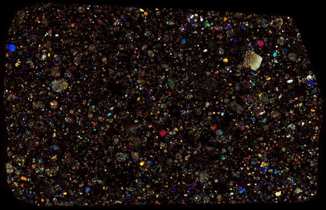 Northwest Africa (NWA) 3358 Meteorite Thin Section - XPL HDR Pathscan Enabler.

Solar Anamnesis, CC BY-NC-SA 2.0 via Flickr: https://flic.kr/p/2hxmnEU
