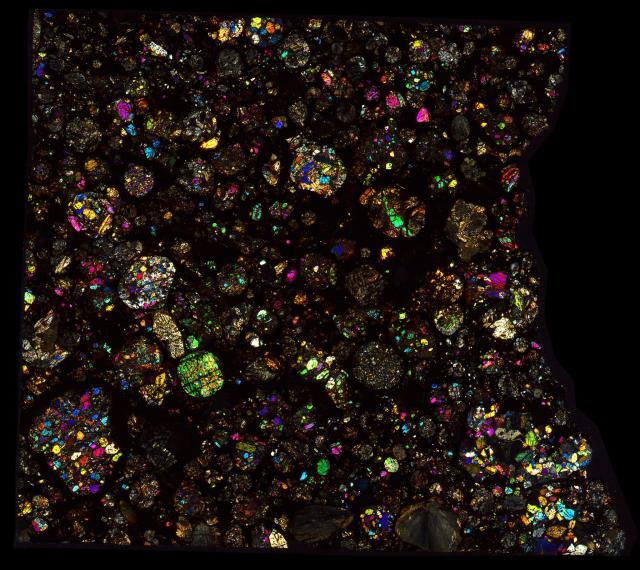 Northwest Africa (NWA) 6169 Meteorite Thin Section - XPL HDR Pathscan Enabler.

Solar Anamnesis, CC BY-NC-SA 2.0 via Flickr: https://flic.kr/p/2hQ3tbF