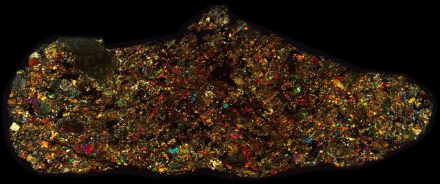 Jiddat al Harasis 073 Meteorite Thin Section - XPL HDR Pathscan Enabler.

Solar Anamnesis, CC BY-NC-SA 2.0 via Flickr: https://flic.kr/p/2it4a4A