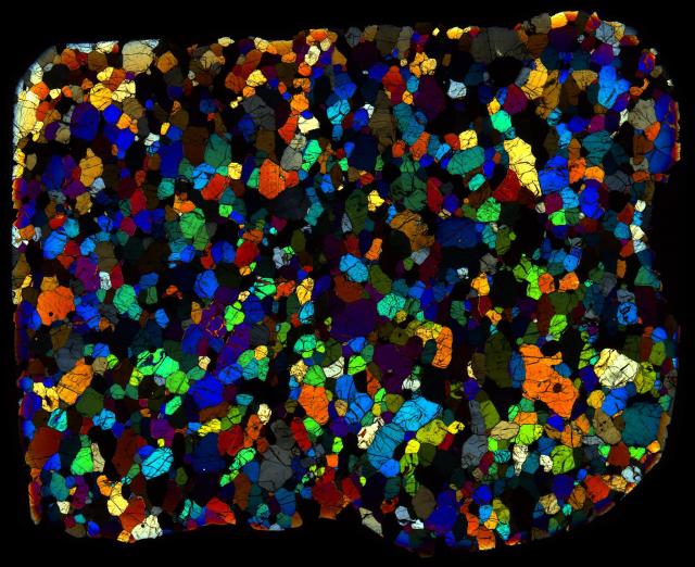 Northwest Africa (NWA) 3151 Meteorite Thin Section - XPL HDR Pathscan Enabler.

Solar Anamnesis, CC BY-NC-SA 2.0 via Flickr: https://flic.kr/p/2ihQjQm