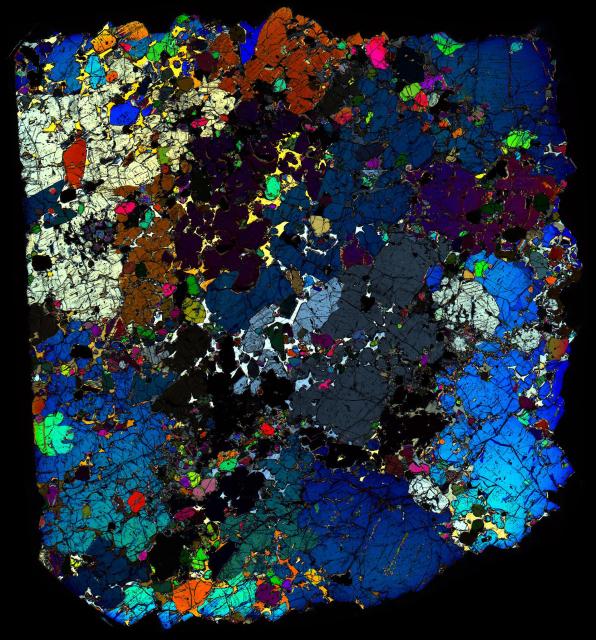 Northwest Africa (NWA) 6704 Meteorite Thin Section - XPL HDR Pathscan Enabler.

Solar Anamnesis, CC BY-NC-SA 2.0 via Flickr: https://flic.kr/p/2iy68xM