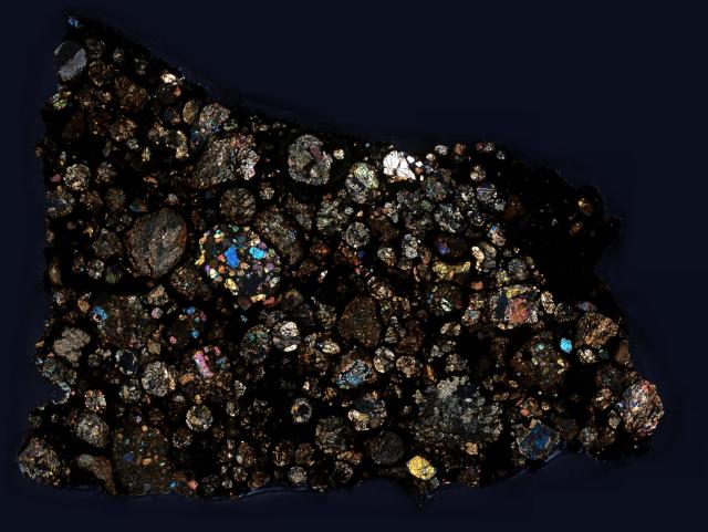 Northwest Africa (NWA) 8276 Meteorite Thin Section.

Solar Anamnesis, CC BY-NC-ND 2.0 via Flickr: https://flic.kr/p/QYFn2y