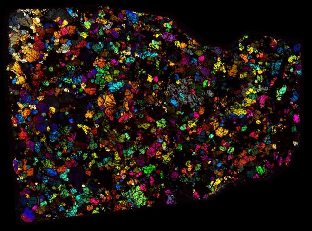 Northwest Africa (NWA) 5363 Meteorite Thin Section - XPL HDR Pathscan Enabler.

Solar Anamnesis, CC BY-NC-SA 2.0 via Flickr: https://flic.kr/p/2ifeCuf