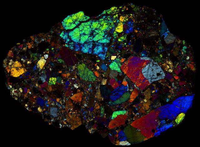 Northwest Africa (NWA) 11129 Meteorite Thin Section - XPL HDR Pathscan Enabler.

Solar Anamnesis, CC BY-NC-SA 2.0 via Flickr: https://flic.kr/p/2hZSAha