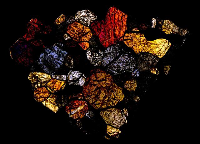 Thin Section of the Itqiy Meteorite in Cross Polarized Light.

Solar Anamnesis, CC BY-NC-ND 2.0 via Flickr: https://flic.kr/p/Nz1qgu