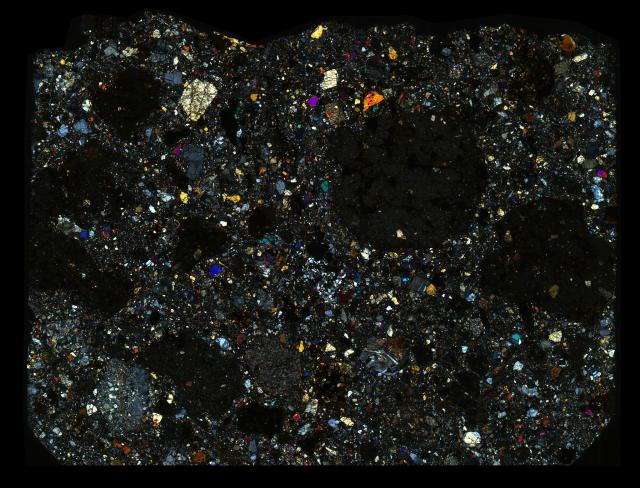 Northwest Africa (NWA) 10674 Meteorite Thin Section - XPL HDR Pathscan Enabler.

Solar Anamnesis, CC BY-NC-SA 2.0 via Flickr: https://flic.kr/p/2hRyjt5