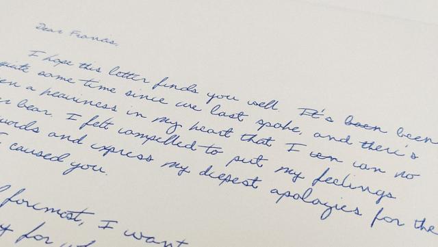 Close-up photo of a letter that appears to be handwritten, from "Dear Ai"