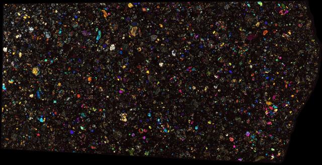 Northwest Africa (NWA) 6211 Meteorite Thin Section - XPL HDR Pathscan Enabler.

Solar Anamnesis, CC BY-NC-SA 2.0 via Flickr: https://flic.kr/p/2hjqHEs