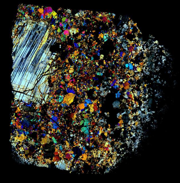 Northwest Africa (NWA) 2999 Meteorite Thin Section in Cross Polarized Light.

Solar Anamnesis, CC BY-NC-ND 2.0 via Flickr: https://flic.kr/p/NRiCMU