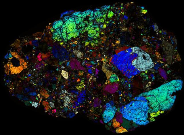 Northwest Africa (NWA) 11129 Meteorite Thin Section - XPL HDR Pathscan Enabler.

Solar Anamnesis, CC BY-NC-SA 2.0 via Flickr: https://flic.kr/p/2icLPoA