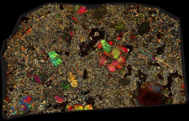 Dar al Gani 489 Meteorite Thin Section - XPL HDR Pathscan Enabler.

Solar Anamnesis, CC BY-NC-SA 2.0 via Flickr: https://flic.kr/p/2ivJp6E