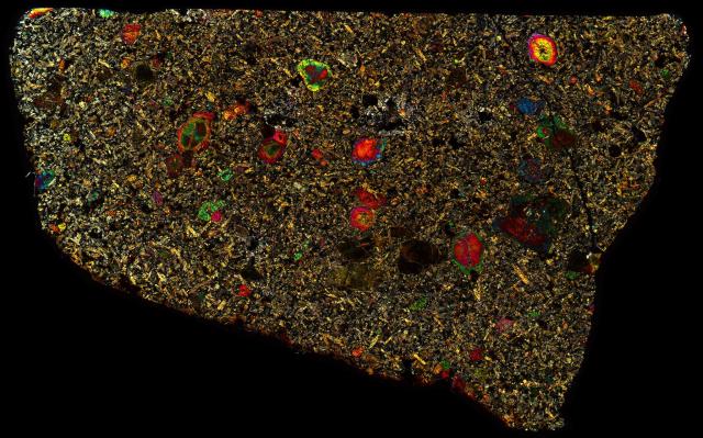 Northwest Africa (NWA) 8716 Meteorite Thin Section - XPL HDR Pathscan Enabler.

Solar Anamnesis, CC BY-NC-SA 2.0 via Flickr: https://flic.kr/p/2hZRthu