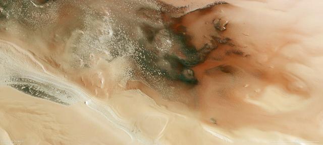 "Cryptic terrain in Australe Scopuli on Mars."

ESA/DLR/FU Berlin, CC BY-SA IGO 3.0, CC BY-SA 3.0 IGO, via Wikimedia Commons.