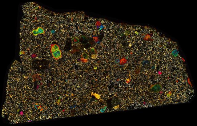 Northwest Africa (NWA) 8716 Meteorite Thin Section - XPL HDR Pathscan Enabler.

Solar Anamnesis, CC BY-NC-SA 2.0 via Flickr: https://flic.kr/p/2icHf1f