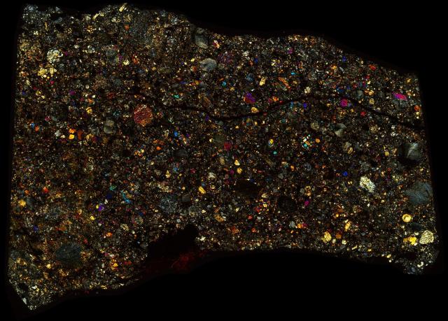 Northwest Africa (NWA) 6550 Meteorite Thin Section - XPL HDR Pathscan Enabler.

Solar Anamnesis, CC BY-NC-SA 2.0 via Flickr: https://flic.kr/p/2iSAAZe