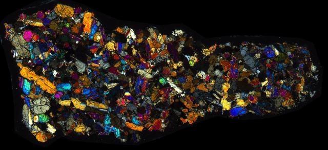 Northwest Africa (NWA) 998 Meteorite Thin Section - XPL HDR Pathscan Enabler.

Solar Anamnesis, CC BY-NC-SA 2.0 via Flickr: https://flic.kr/p/2hRyjvQ