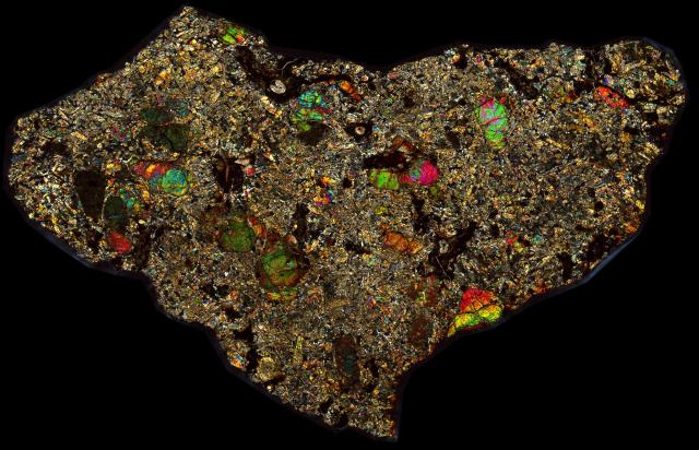 Dar al Gani 489 Meteorite Thin Section - XPL HDR Pathscan Enabler.

Solar Anamnesis, CC BY-NC-SA 2.0 via Flickr: https://flic.kr/p/2hXQtjo