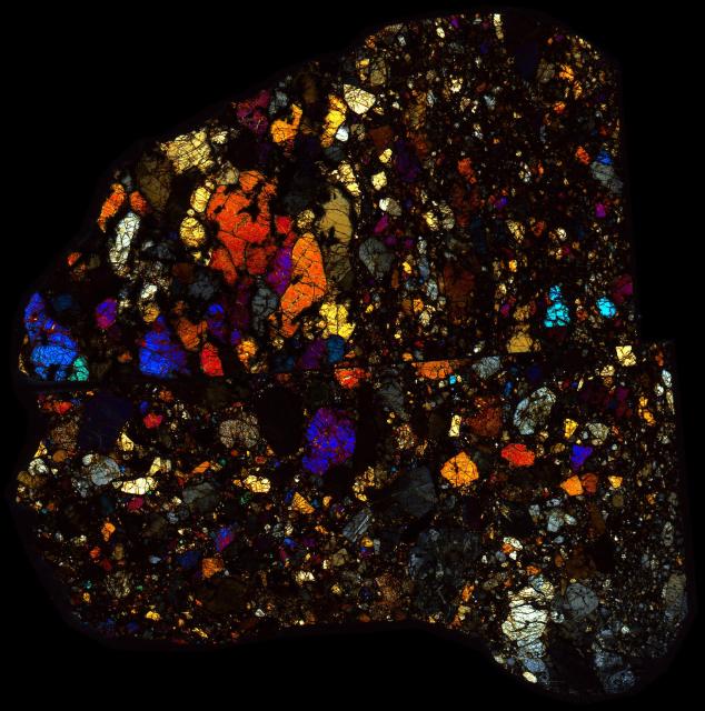 Dar al Gani 319 Meteorite Thin Section - XPL HDR Pathscan Enabler.

Solar Anamnesis, CC BY-NC-SA 2.0 via Flickr: https://flic.kr/p/2ihGmwx