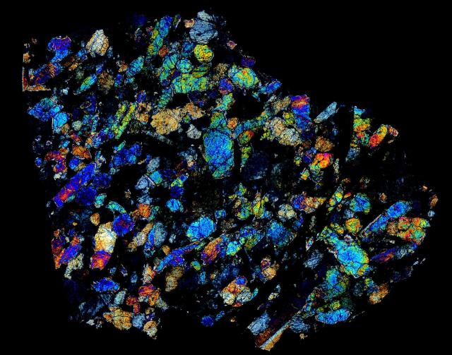 Zagami Meteorite Thin Section in cross polarized light.

Solar Anamnesis, CC BY-NC-ND 2.0 via Flickr: https://flic.kr/p/NRjxP5