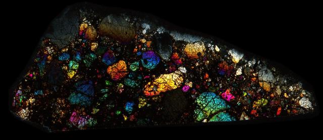 Northwest Africa (NWA) 5488 Meteorite Thin Section - XPL HDR Pathscan Enabler.

Solar Anamnesis, CC BY-NC-SA 2.0 via Flickr: https://flic.kr/p/2iBWg58