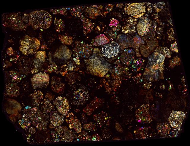 Northwest Africa (NWA) 5205 Meteorite Thin Section - XPL HDR Pathscan Enabler.

Solar Anamnesis, CC BY-NC-SA 2.0 via Flickr: https://flic.kr/p/2hpoueN