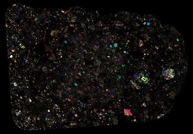 Northwest Africa (NWA) 980 Meteorite Thin Section - XPL HDR Pathscan Enabler.

Solar Anamnesis, CC BY-NC-SA 2.0 via Flickr: https://flic.kr/p/2hhYZvu