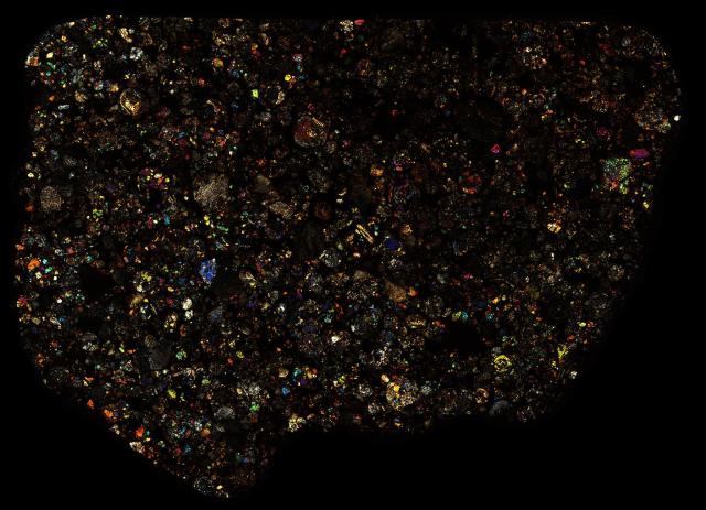 Northwest Africa (NWA) 1930 Meteorite Thin Section - XPL Pathscan Enabler.

Solar Anamnesis, CC BY-NC-SA 2.0 via Flickr: https://flic.kr/p/2hi118T