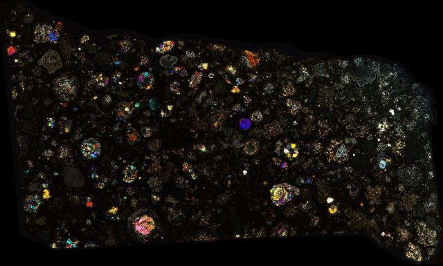 Northwest Africa (NWA) 2224 Meteorite Thin Section - XPL HDR Pathscan Enabler.

Solar Anamnesis, CC BY-NC-SA 2.0 via Flickr: https://flic.kr/p/2hm1e7a