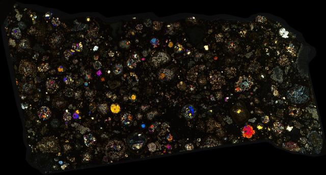 Northwest Africa (NWA) 2224 Meteorite Thin Section - XPL HDR Pathscan Enabler.

Solar Anamnesis, CC BY-NC-SA 2.0 via Flickr: https://flic.kr/p/2hm1Yz8