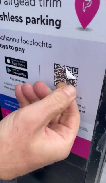 Picture of fake QR code on a parking machine area sign, Ireland.