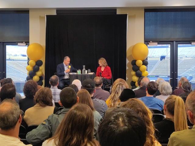 Nabil Echchaibi and Naomi Klein sitting alongside each other 