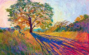 Very colourful open impressionist style painting of a large tree with leaves in several colours, and its deep blue shadow in front of it on a colourful field. on the right is more high colourful foliage. The sky is coloured soft blue and soft pink. 