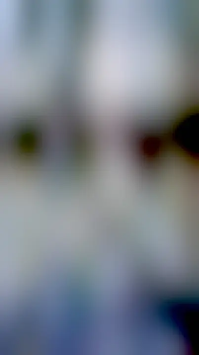 Translucent frozen clover leaf, where only the veins of the leaf are still green. There is ice on the ground around it and bare tree trunks in the background. The sky is a pale, watery blue.

ALT text by @Susan60@aus.social