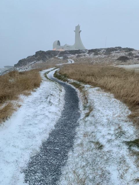 Alien church with snowy path