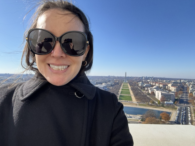 Me standing in front of the Capitol mall atop the dome.