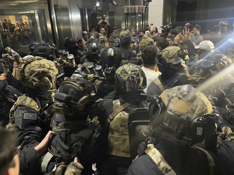 military trying to enter parliament