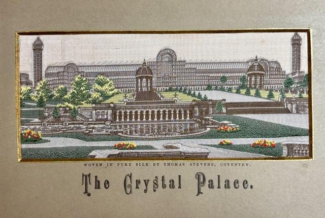 In small print above the title, a note reads "Woven in silk by Thomas Sevens, Coventry."