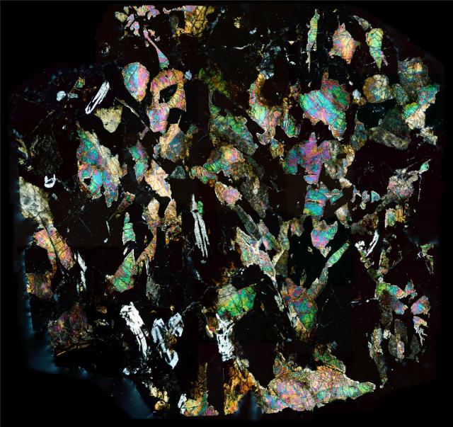 "Los Angeles 002 Meteorite Thin Section."

Solar Anamnesis, CC BY-NC-ND 2.0 via Flickr: https://flic.kr/p/28TQUKn