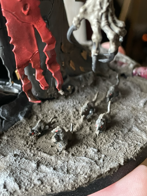 Little rats on the base next to him. 