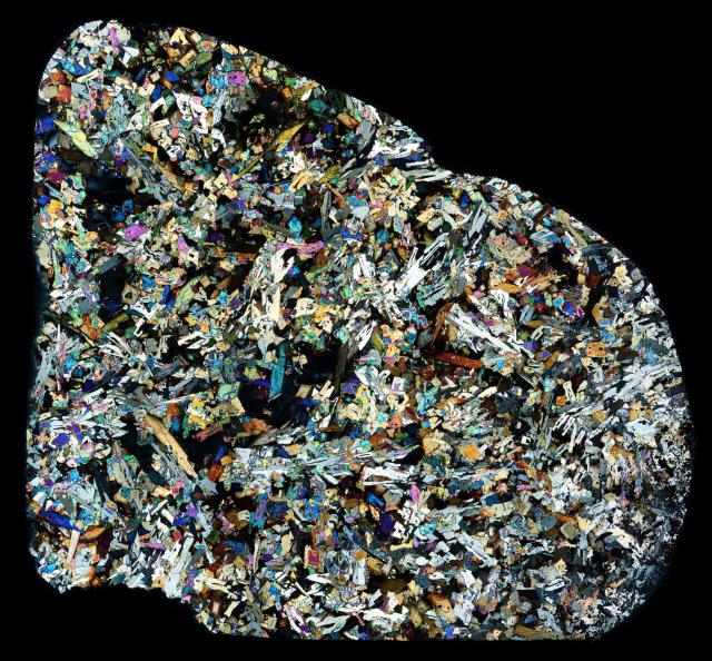 One of the first I made, Angrites captured my attention and led to more work with meteorite thin sections.

XPL Thin Section of the D'Orbigny (Angrite) Meteorite. Found in July 1979 in Buenos Aires, Argentina.

https://flic.kr/p/Nz1hoL
