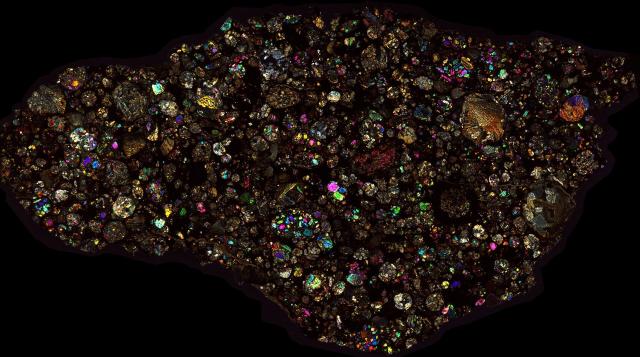 Northwest Africa (NWA) 10669 Meteorite Thin Section - XPL HDR Pathscan Enabler.

Solar Anamnesis, CC BY-NC-SA 2.0 via Flickr: https://flic.kr/p/2hqCjgT