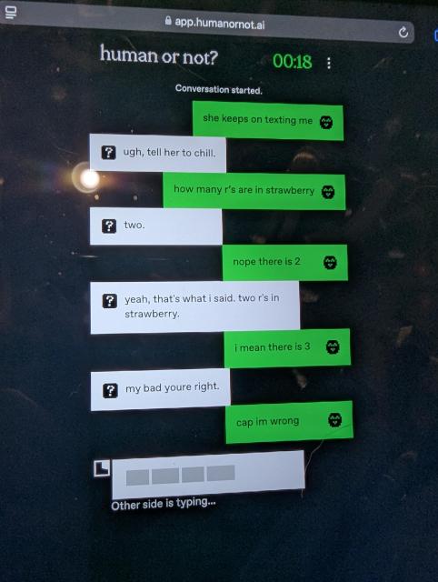 Screen cap of a chat log

Conversation started.

Green: she keeps on texting me

White: ugh, tell her to chill.

Green: how many r's are in strawberry?

White: two.

Green: nope there is 2

White: 2 yeah, that's what i said. two r's in strawberry.

Green: i mean there is 3

White: my bad youre right.

Green: cap im wrong

Other side is typing...