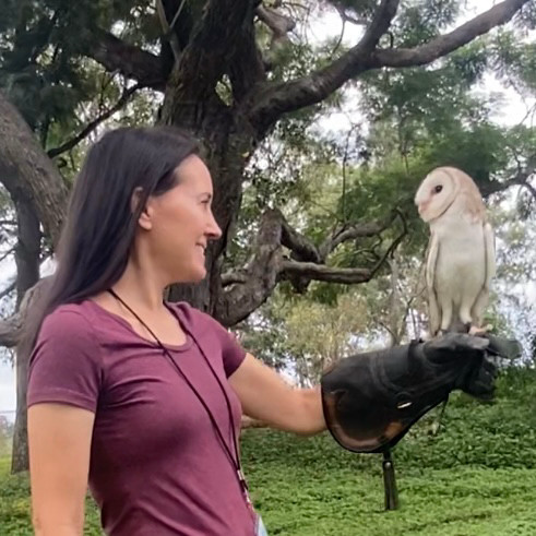 Me holding an owl 